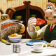 Wallace enjoys a slice of jam on toast while Gromit begrudgingly stares at his master over the top of his newspaper.